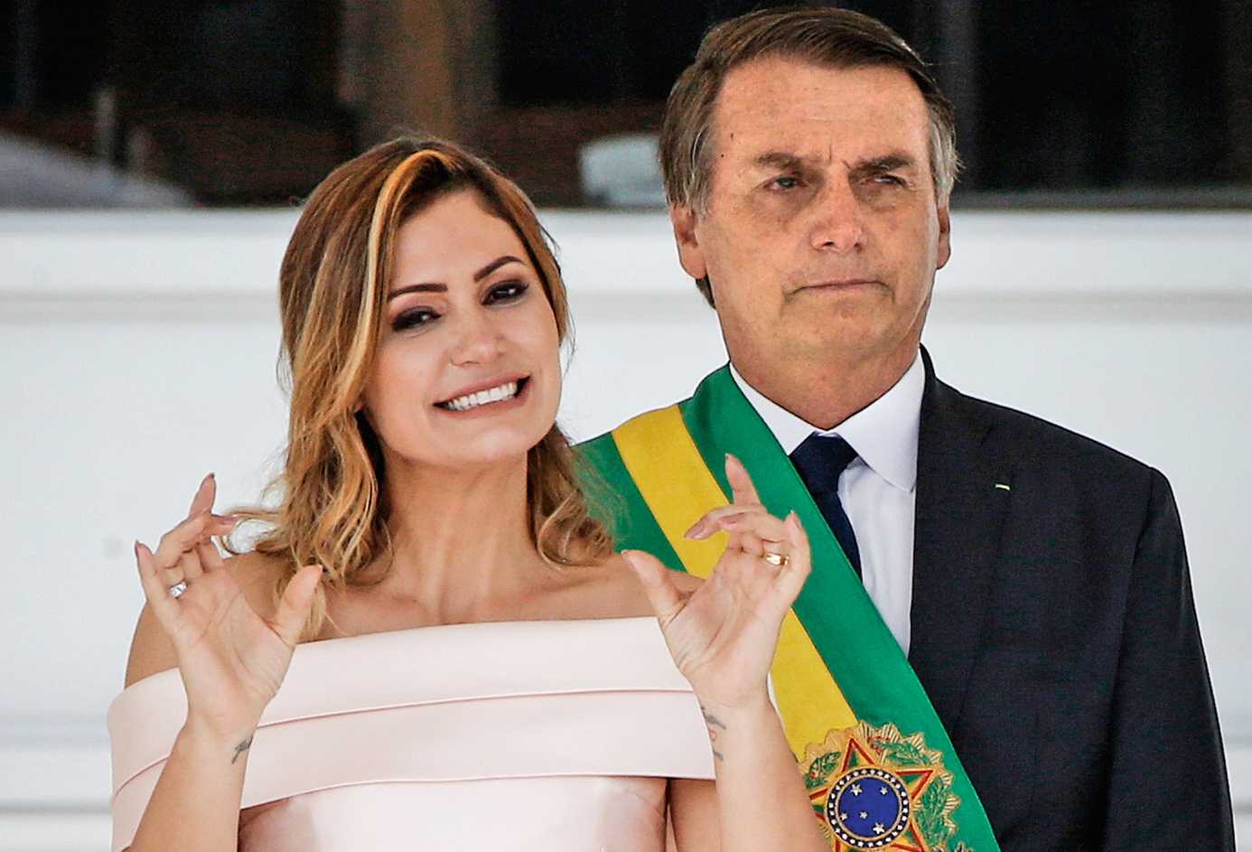 President Bolsonaro and first lady Michelle during a political function